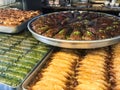 trays with various local sweets in pastry shop