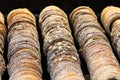 Trdelnik cooks over an open fire at the Hungarian Christmas market close-up