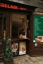 Trdelnik - traditional czech bakery. Czech sweet pastry baking on the street market in Cesky Krumlov.