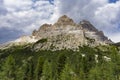 Tre Cime di Lavaredo on a background of clouds. Dolomites. Italy Royalty Free Stock Photo