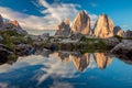 Tre Cime di Lavaredo with real reflection in lake, Dolomites Alps Mountains Royalty Free Stock Photo