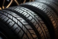 Tread assortment Closeup of diverse car tires on display in shop setting