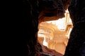 The treasure house of Petra from a perspective between the rocks in Wadi Musa, Petra, Jordan