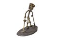 Treasure hunt figurine welded from bolts and nuts on white isolated background Royalty Free Stock Photo