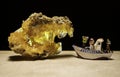 Treasure hunter and tourist find the yellow crystal stone Royalty Free Stock Photo