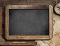 Treasure map, blackboard, old compass and ruler on Royalty Free Stock Photo