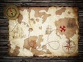 Treasure map and vintage compass standing on old wood table. 3D illustration Royalty Free Stock Photo