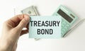 Treasury bonds word written on a piece of paper.
