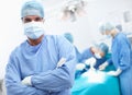 Treating patients with the care and attention they deserve. Portrait of a confident surgeon standing in an operating Royalty Free Stock Photo