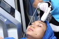 medical beauty device instrument cold process on face in hospital clinic
