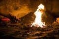 Treatment of molten metal close-up. Handmade blacksmith