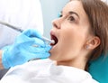 Treatment of the tooth, the dentist cleans loss