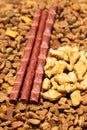 Treats for cats meat sticks sausages and catnip cookies. Royalty Free Stock Photo