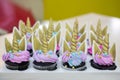 treats in the form of muffins with horns. unicorn cupcake. beautiful decoration, delicious pastries