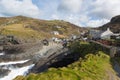 Trebarwith Strand Cornwall England UK coast village between Tintagel and Port Isaac waves crashing on rocks Royalty Free Stock Photo