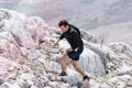 Trebinje, Bosnia and Herzegovina - Skyrunning race runner on rocky mountain ridge