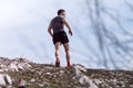 Trebinje, Bosnia and Herzegovina - Skyrunning race runner on rocky mountain ridge