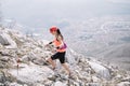 Trebinje, Bosnia and Herzegovina - Skyrunning race runner on rocky mountain ridge