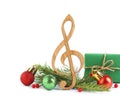 Treble clef with decorations on . Christmas music concept Royalty Free Stock Photo