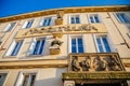 Trebon, South Bohemia, Czech Republic, 9 October 2021: bank buildings of ceska sporitelna at main Masarykovo square, stone statue