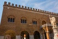 Trecento Palace and Teresona Statue in Treviso, Italy