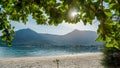 tree beach defocused. tropical beach background. blur light of calm sea and sky. Scenic background of sunlight. Royalty Free Stock Photo