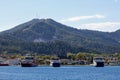 Tree Clad Cliffs Facing the Sea behind ferry port on Thassos Island, Greece Royalty Free Stock Photo