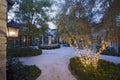 Tree Decorated With Fairylights In Courtyard Royalty Free Stock Photo