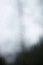 Tree distorted by rain drops on window pane Royalty Free Stock Photo