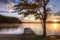 Tree and Dock Adirondacks Sunset Royalty Free Stock Photo