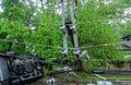 electric pole after hurricane damaged car turned over after accident