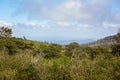 Tree Foreground Out To Mountain Ranges In The Distance And Blue Sky Royalty Free Stock Photo