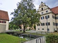 Tree in front of beautiful houses in Zwiefalten