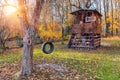 Tree house in autumn garden