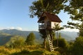 Tree house in the mountains, a children`s treehouse Royalty Free Stock Photo