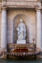 A fountain full of water that fascinates the healing fountain in Spain with a statue of the Greek and Roman Gods beautiful screens