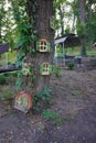 Tree houses for squirrels and birds in the park.