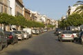 Tree lined narrow street of village in Southern Spain off highway A49 west of Sevilla