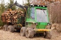 Tree log hydraulic manipulator - tractor Royalty Free Stock Photo