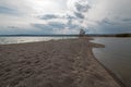 Tree on narrow sandbar called Hard Road to Follow on the banks of Yellowstone Lake in Yellowstone National Park in Wyoming USA