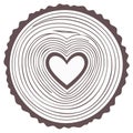 Tree ring cross section with heart shape in the center wood grain design Royalty Free Stock Photo