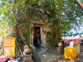 Tree root covering ancient temple : Wat Bang Kung at Amphawa