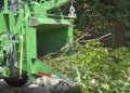 Industrial chipper mulching branches