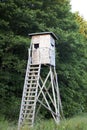 Tree stand, deer stand for hunters in forest