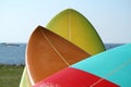 Tree surfboard on each other in different shapes and colors Royalty Free Stock Photo