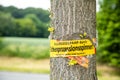 Tree with text vorsicht allergiegefahr durch eichenprozessionsspinner Raupen und Nester nicht berÃÂ¼hren, in englisch beware of