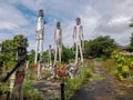 Three giant stone figures at Wat Mae Takhrai