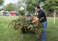 Tree Trimmer Loading Limbs