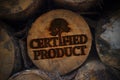 Tree trunks with logo branding certified product