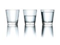 tree water glasses empty half and full philosophy Royalty Free Stock Photo